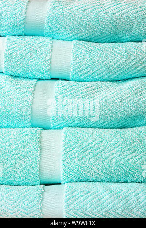 Pile of fresh and soft bath towels Stock Photo