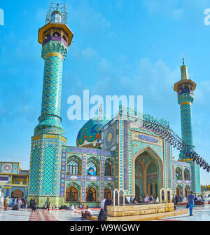 TEHRAN, IRAN - OCTOBER 25, 2017: The facade of spectacular Imamzadeh Saleh Mausoleum, with large portal, slender minarets and dome, decorated with fin Stock Photo