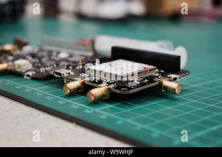 Photo of a black and white circuit board with a chip Stock Photo