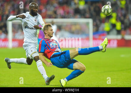 Pilsen, Czech Republic. 15th Aug, 2019. From right soccer players JAKUB BRABEC of Viktoria Plzen and DIDIER LAMKEL ZE of Royal Antwerp in action during the football Europa League 3rd qualifying round return match: Viktoria Plzen vs Royal Antwerp in Pilsen, Czech Republic, August 15, 2019. Credit: Miroslav Chaloupka/CTK Photo/Alamy Live News Stock Photo