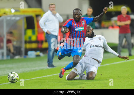 Pilsen, Czech Republic. 15th Aug, 2019. From left soccer players JOEL KAYAMBA of Viktoria Plzen and DIDIER LAMKEL ZE of Royal Antwerp in action during the football Europa League 3rd qualifying round return match: Viktoria Plzen vs Royal Antwerp in Pilsen, Czech Republic, August 15, 2019. Credit: Miroslav Chaloupka/CTK Photo/Alamy Live News Stock Photo