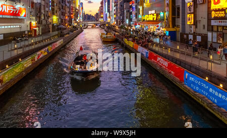 Osaka, Japan - October 28 2018: Dotonbori is one of the most popular tourist destination runs alongside Dotonbori canal between Dotonboribashi and Nip Stock Photo