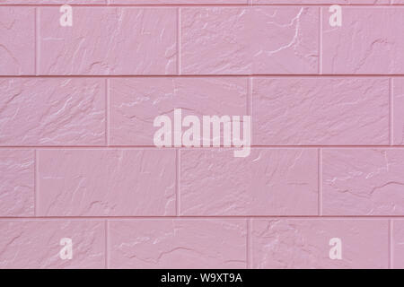 pink concrete brick wall pattern texture for background. Stock Photo