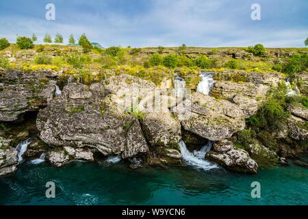 Montenegro, Many waterfalls of turquoise river cijevna at niagara falls destination in magic atmosphere Stock Photo