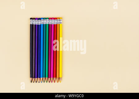 Back to school creative template with colored pencils. Stock Photo