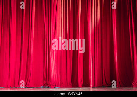 Red curtains in a theater scene of the show. Stock Photo