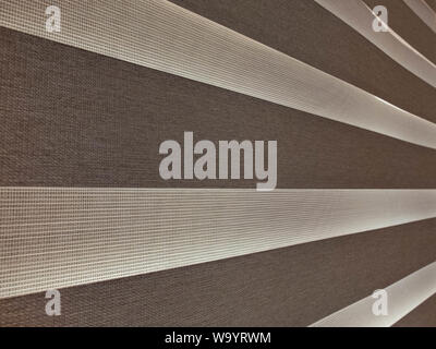 Horizontal striped curtains made from natural material. Stock Photo