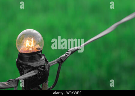 An old lamp shines in the night festival. Stock Photo