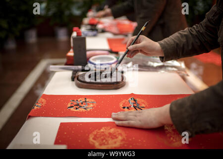 Write Spring Festival couplets Stock Photo - Alamy