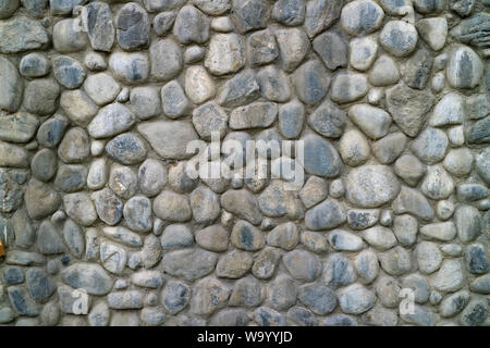 Grey Round Stone Wall Texture for Abstract Background Stock Photo
