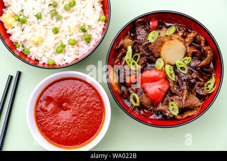 Chinese Style Beef in Black Bean Sauce With Egg Fried Rice Stock Photo