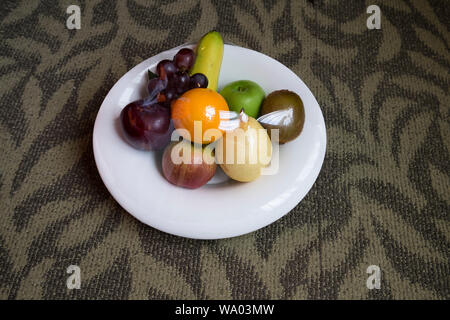 A fruit plate, still wrapped in plastic. In Alor Setar, Kedah, Malaysia. Stock Photo