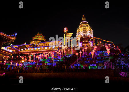 The extensive, over the top lighting at the famed Kek Lok Si Chinese temple in George Town, Penang, Malaysia. The temple puts on the amazing light sho Stock Photo