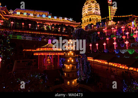 The extensive, over the top lighting at the famed Kek Lok Si Chinese temple in George Town, Penang, Malaysia. The temple puts on the amazing light sho Stock Photo