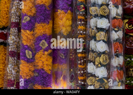 Plastic flower strands are for sale at an Indian Hindu religious items shop in George Town, Penang, Malaysia. Stock Photo