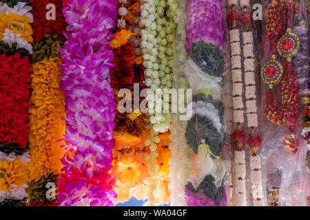 Plastic flower strands are for sale at an Indian Hindu religious items shop in George Town, Penang, Malaysia. Stock Photo