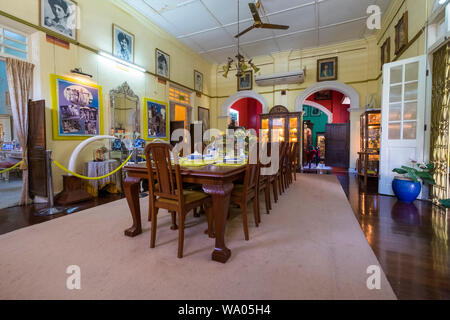 Dining room at Diraja Istana Batu, former home to Sultans, in Kota Bharu, Malaysia. Stock Photo