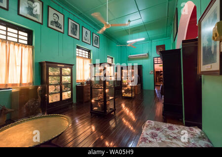 Green drawing room at Diraja Istana Batu, former home to Sultans, in Kota Bharu, Malaysia. Stock Photo