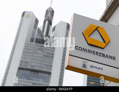 15 August 2019, Hessen, Frankfurt/Main: The sign of a Commerzbank branch is attached to a house façade near the Commerzbank headquarters. Photo: Arne Dedert/dpa Stock Photo