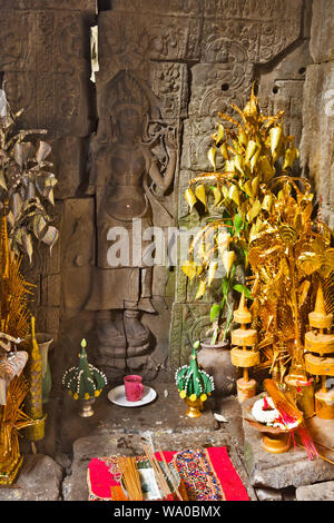 the Queen Indradevi statue inside Preah Khan temple, Khmer ruins in Angkor Thom,  UNESCO World Heritage Site in Siem Reap Cambodia Stock Photo