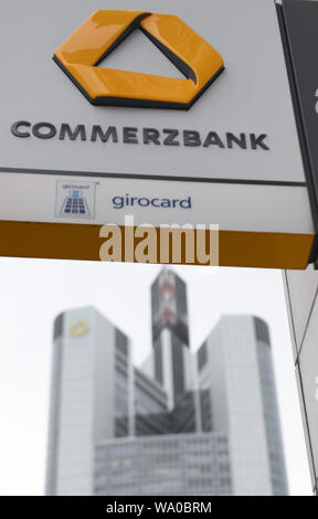 15 August 2019, Hessen, Frankfurt/Main: The sign of a Commerzbank branch is attached to a house façade near the Commerzbank headquarters. Photo: Arne Dedert/dpa Stock Photo