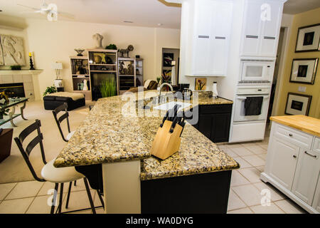 Modern Granite Kitchen Counter Bar And Open Living Room Stock Photo