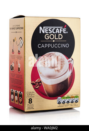 LONDON, UK - AUGUST 15, 2019: Pack of Nescafe Gold Cappuccino on white. Stock Photo