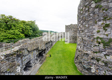 The impressive remains of the Outer Ward at the historic Beaumaris ...