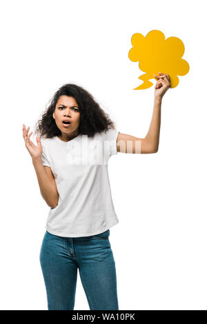 upset african american girl holding yellow thought bubble isolated on white Stock Photo