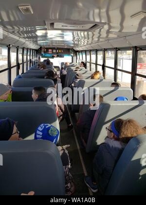 Children riding school bus Stock Photo - Alamy