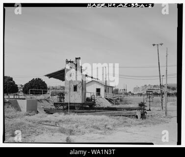 BLAISDELL SLOW SAND FILTER WASHING MACHINE. VIEW LOOKING WEST. THE NONHISTORIC CHEMICAL BUILDING IS SEEN IN THE BACKGROUND. - Yuma Main Street Water Treatment Plant, Blaisdell Slow Sand Filter Washing Machine, Jones Street at foot of Main Street, Yuma, Yuma County, AZ Stock Photo