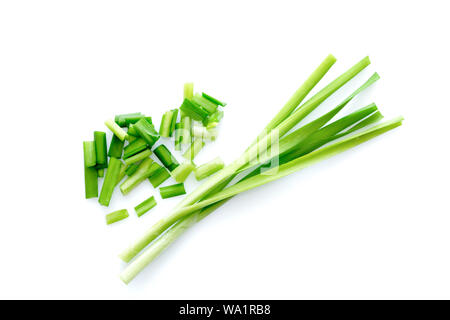 Fresh healthy organic green vegetable garlic chives, chinese chive sliced, green herb isolated on white background. Stock Photo