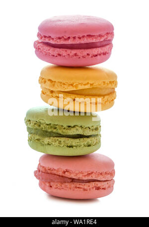 Fresh bright colored of Macarons, Sweet and colorful french macaroons isolated on white background with clipping path. Stock Photo