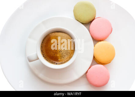 Macarons with a coffee cup isolated on white background, Good morning or have a nice day message concept, white cup of espresso coffee with colourful Stock Photo