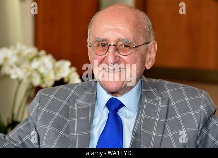 Cologne, Germany. 16th Aug, 2019. Alfred Biolek sits at a reception in the historic town hall on the occasion of the 85th birthday of the former TV presenter on 10 July. Previously, the jubilarian had registered in the Golden Book of the cathedral city. Credit: Horst Galuschka/dpa/Alamy Live News Stock Photo