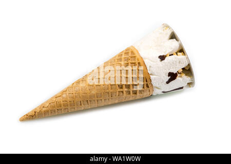 Ice cream cone sprinkled with chocolate and nuts isolated on white background. Stock Photo
