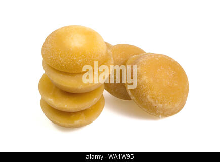 Palm sugar, sugar cubes isolated on white background. Stock Photo