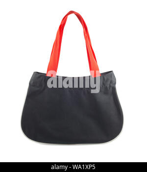 Black fabric bag with red sash isolated on white background, reusable shopping bag with clipping path. Stock Photo