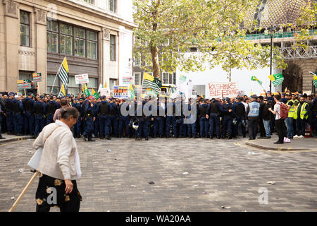 London, UK. 15th August, 2019. Senior India contra protester during a pro-Kashmir protest at the side of India House in London, after being trapped between two pro-Kashmir groups, walks to find a way out. Credit: Joe Kuis / Alamy News Stock Photo