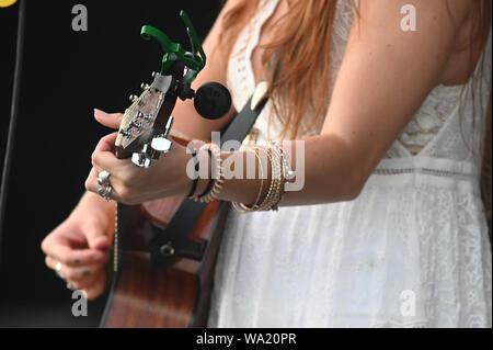 AUG 15, 2019 : Cassidy Daniels performs as the warmup act to Billy Currington during a summer concert held at The Freeman Stage in Selbyville, DE. Stock Photo