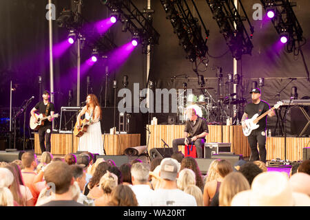 AUG 15, 2019 : Cassidy Daniels performs as the warmup act to Billy Currington during a summer concert held at The Freeman Stage in Selbyville, DE. Stock Photo