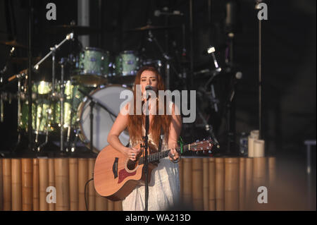 AUG 15, 2019 : Cassidy Daniels performs as the warmup act to Billy Currington during a summer concert held at The Freeman Stage in Selbyville, DE. Stock Photo