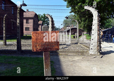Entrance gateway into Auschwitz Concentration Camp in Poland Stock Photo