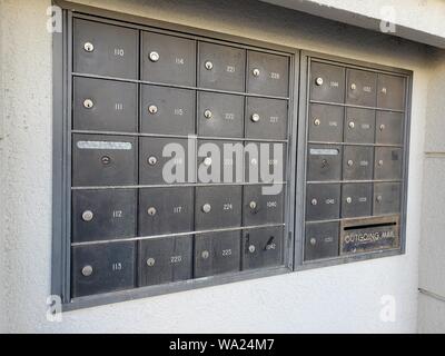 Cluster of residential mailboxes in an apartment or HOA complex setting, August 15, 2019. () Stock Photo