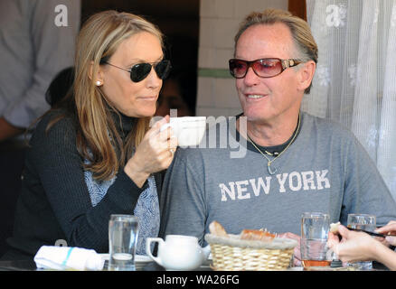 File Pictures: Manhattan, United States Of America. 21st Mar, 2010. NEW YORK - MARCH 20: Peter Fonda and Portia Rebecca Crockett enjoy some oysters at Pastis, in the Meatpacking district. on March 20, 2010 in New York, New York City. People: Peter Fonda and Portia Rebecca Credit: Storms Media Group/Alamy Live News Stock Photo