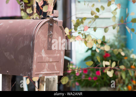 An old rusty mailbox or post box. Stock Photo