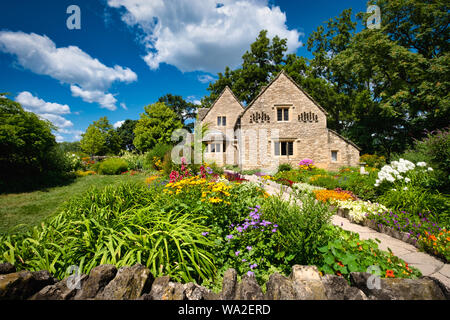 Cotswold Cottage and its surrounding English gardens, located in Greenfield Village at the Henry Ford Museum located in Dearborn, Michigan, USA Stock Photo