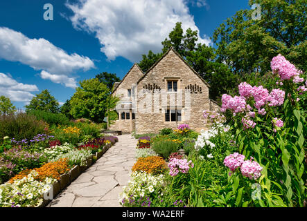 Cotswold Cottage and its surrounding English gardens, located in Greenfield Village at the Henry Ford Museum located in Dearborn, Michigan, USA Stock Photo