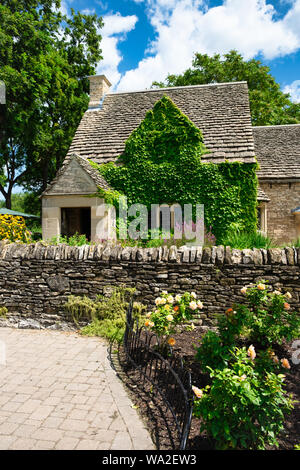 Cotswold Cottage And Its Surrounding English Gardens Located In