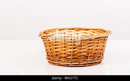 Empty wooden basket for fruit or bread. Stock Photo